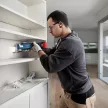 Bosch Akkus multifunkciós gép GOP 185-LI kofferban (1 x 4,0 Ah + töltő + tartozékok)