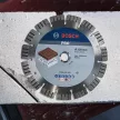 Bosch PRO Abrasive gyémánt vágókorong, 230x22,23 mm, cserép, mészkő, gipsz, gázbeton, beton (Regisztrációval akár ajándék is elérhető!)